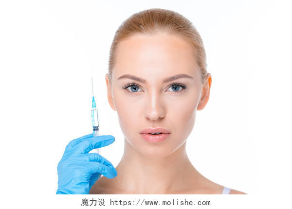 用注射器注射的妇女白色背景摄影图面部整形整容美容面部抗衰